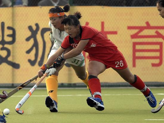 韩国代表团在曲棍球比赛中夺冠